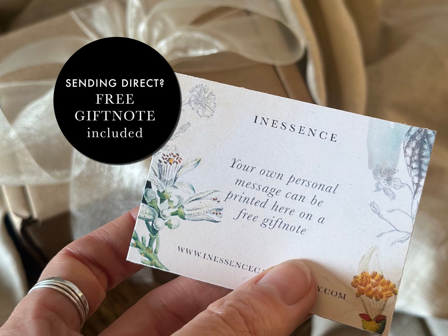 a person holding up a card with a quote on it