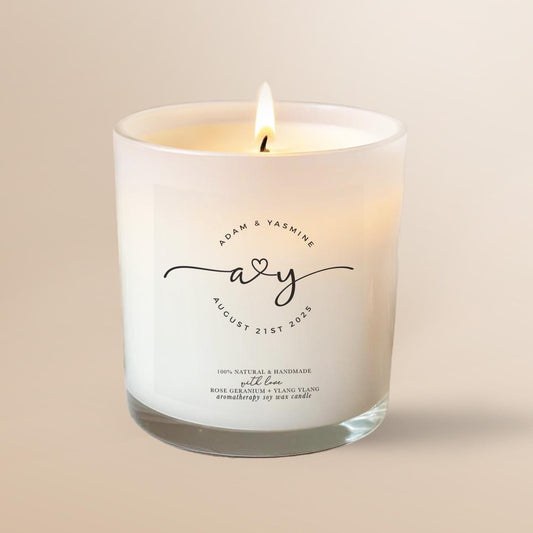 wedding gift candle personalised with names, initials and date. Wedding logo on candle.