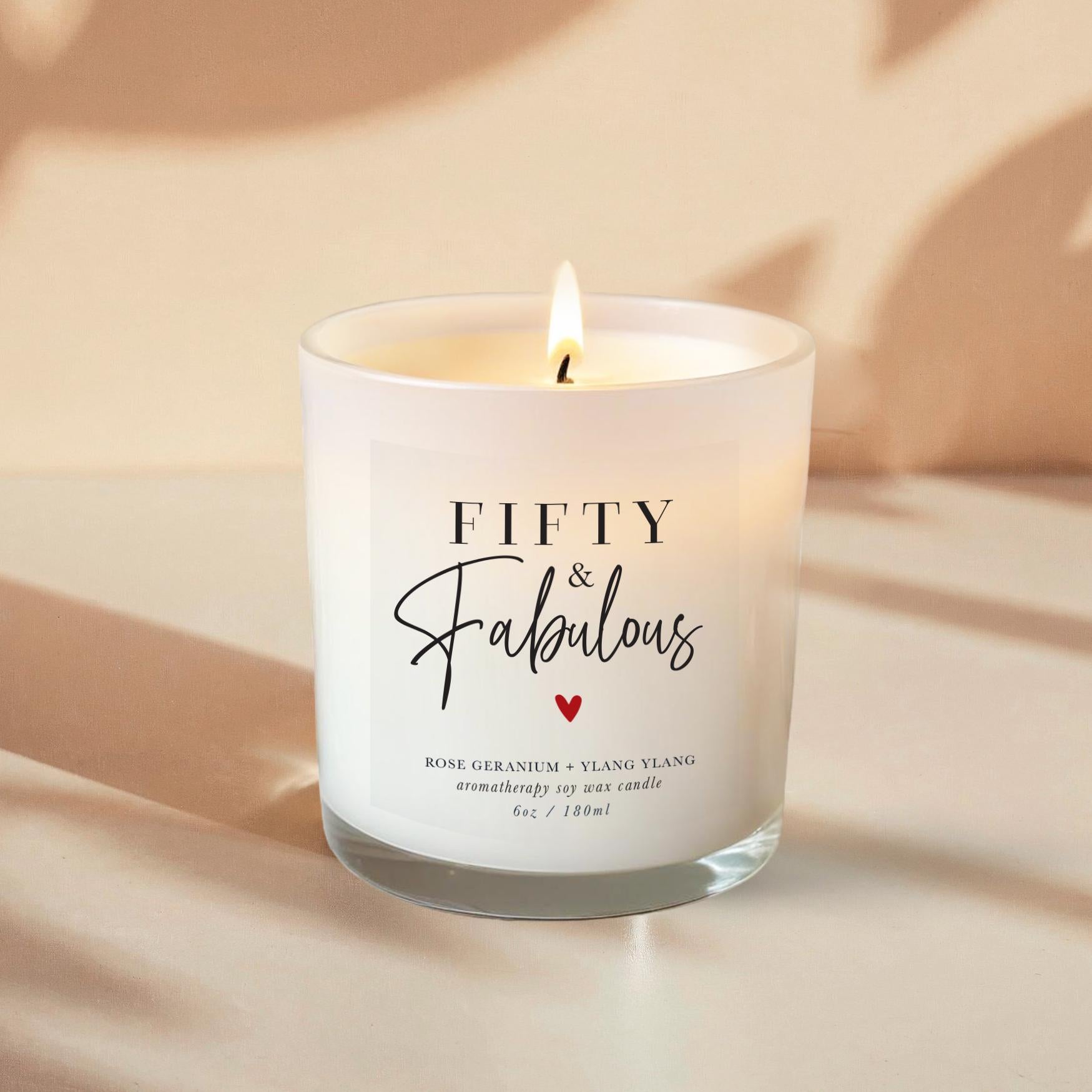 50th Birthday Aromatherapy Candle Gift with a label that says 50 and fabulous and little heart. An all natural candle using only pure essential oils and soy wax